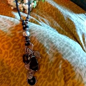 Suede strap dangled with cool charms necklace